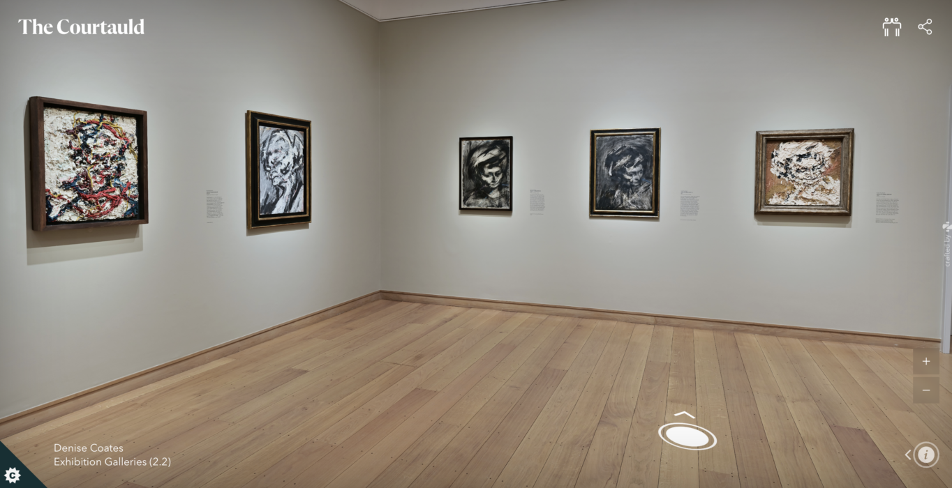 Gallery installation with four artworks hung in frames on the walls.